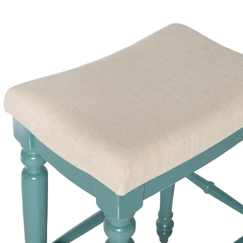 Backless Upholstered Bar Stool with Turned Legs and Padded Seat