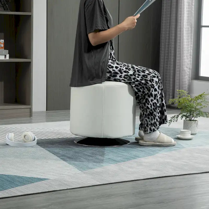 Round Tufted Swivel Ottoman with Padded Seat and Steel Base