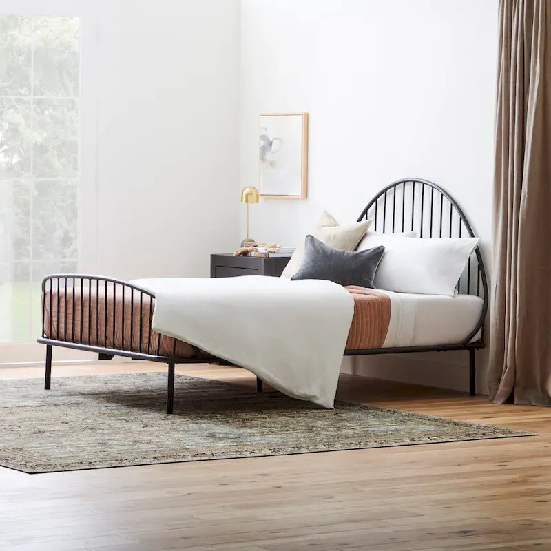 Black Iron Spindle Platform Bed with Arched Headboard and Wood Slats